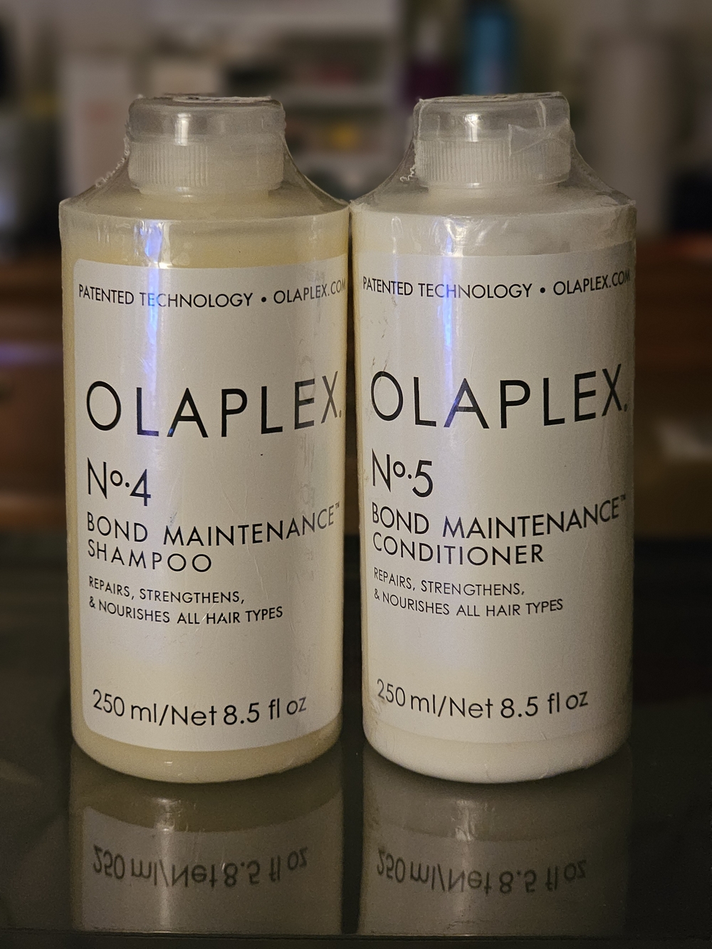 OLAPLEX No.4 & No.5 Bond Maintenance Shampoo and Conditioner — White
